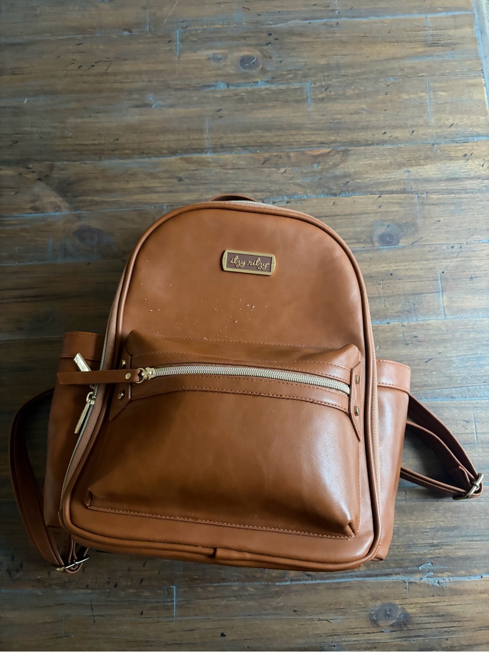 Itzy Ritzy Tan Faux Leather Men's Backpack with Gold Hardware